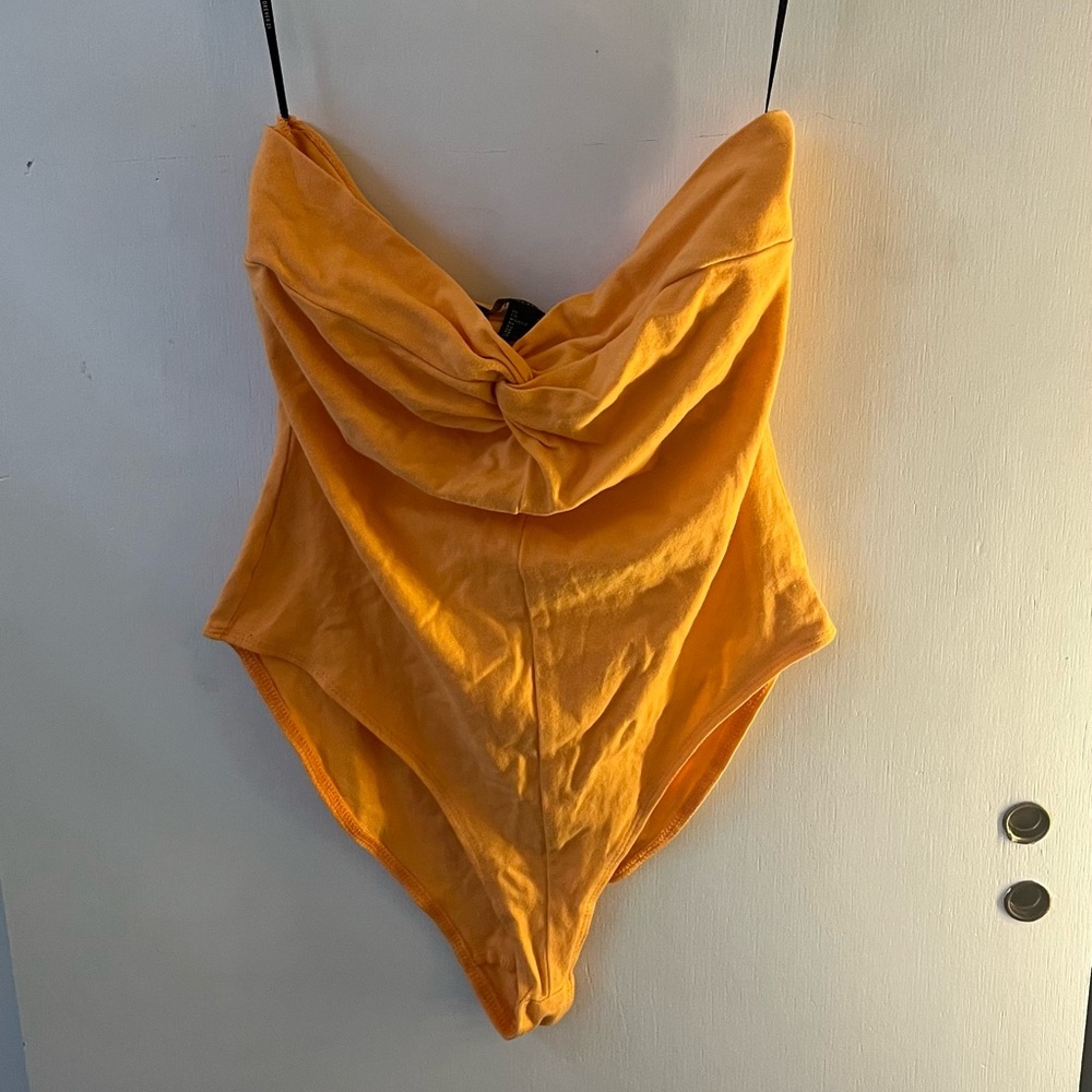 Twisted front orange tube top bodysuit